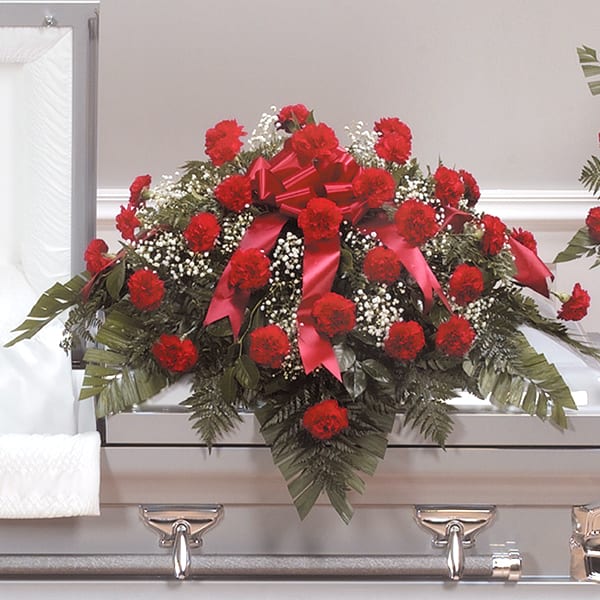Caring Carnation Casket Spray